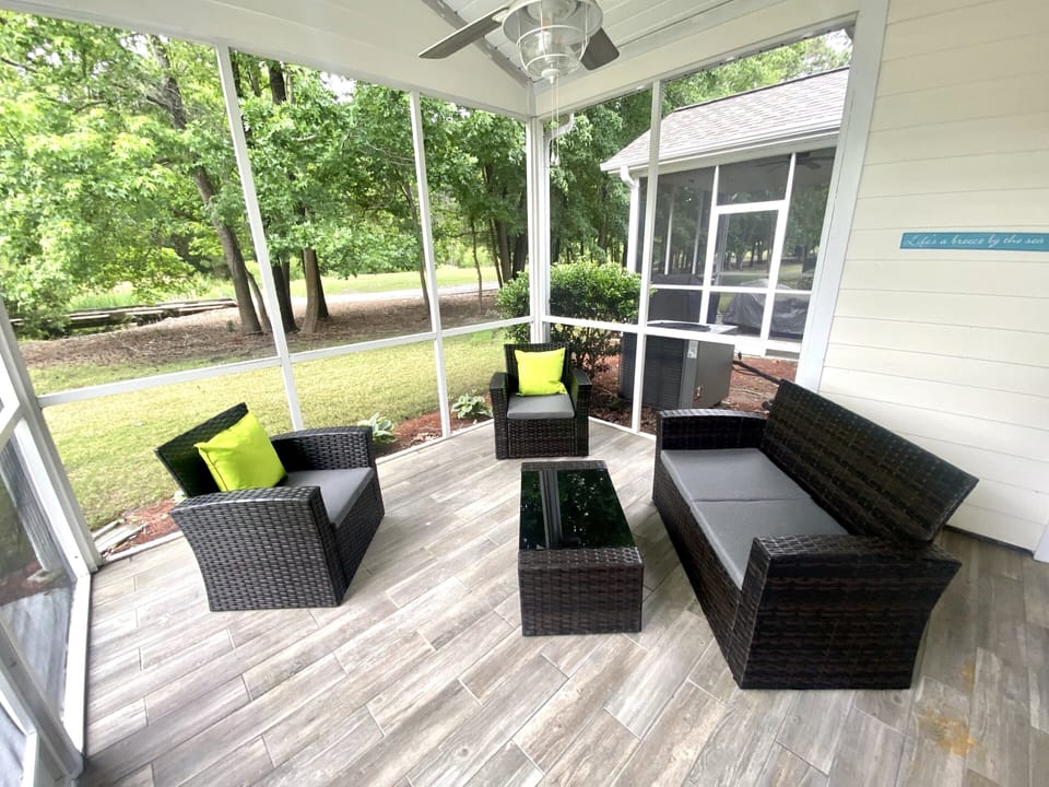 New conversation patio set on the enclosed patio overlooking the golf course