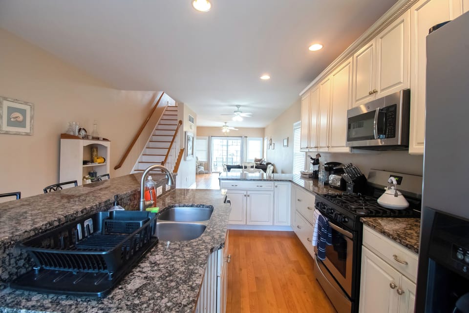 2nd floor Kitchen with stairs to 3rd floor