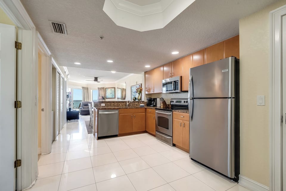Full kitchen: refrigerator, dishwasher, stove/oven, microwave, coffee makers. 