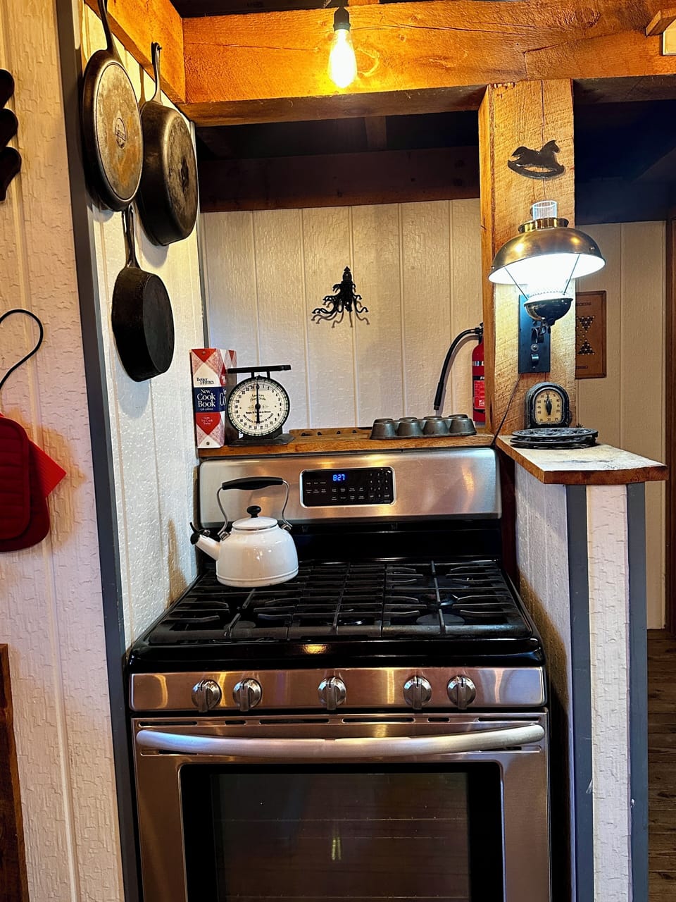 Stove area, next to counter and sink