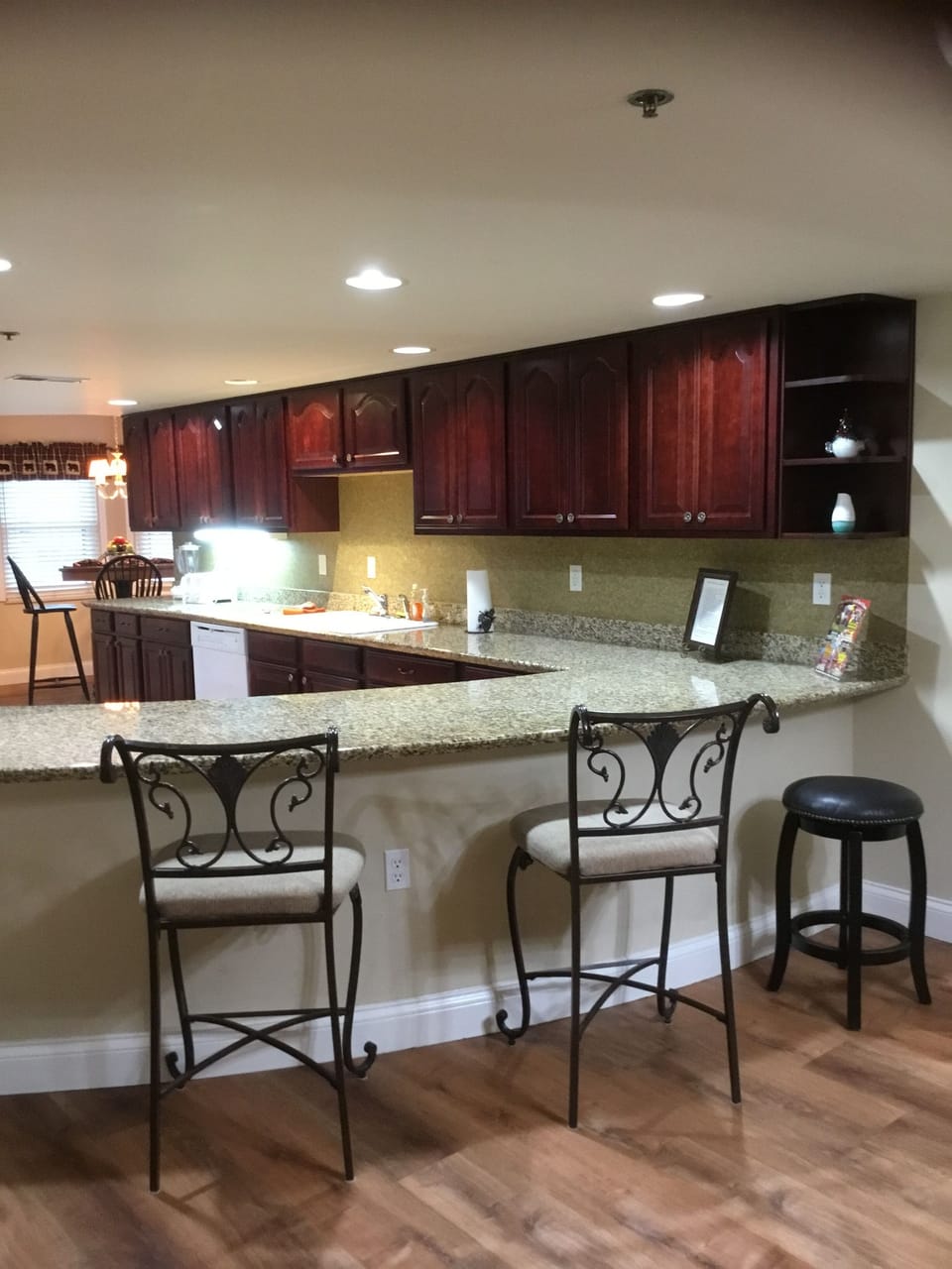 Cherry cabinets in kitchen.