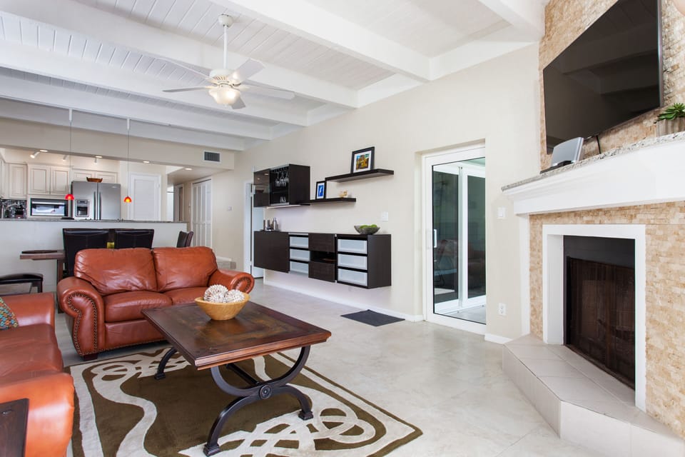 Living/Dining Area with Floating Wall Unit/Bar with under lighting.