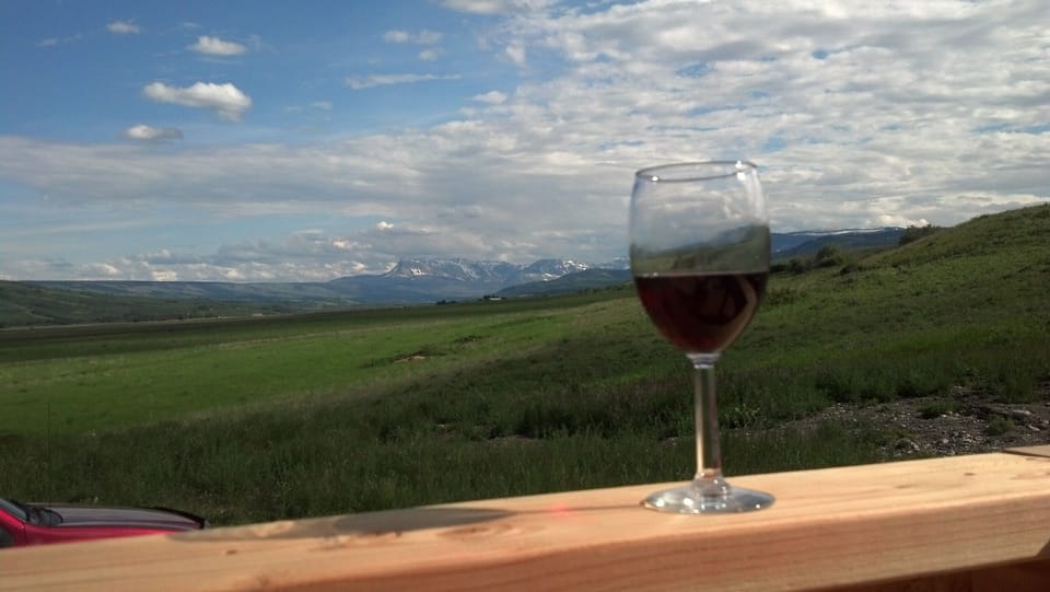 Enjoy an evening glass of wine & views after a full day of hiking Glacier Park