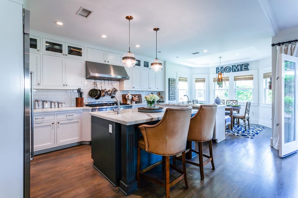 Kitchen with 6 burner gas cooktop and Sub-Zero refrigerator