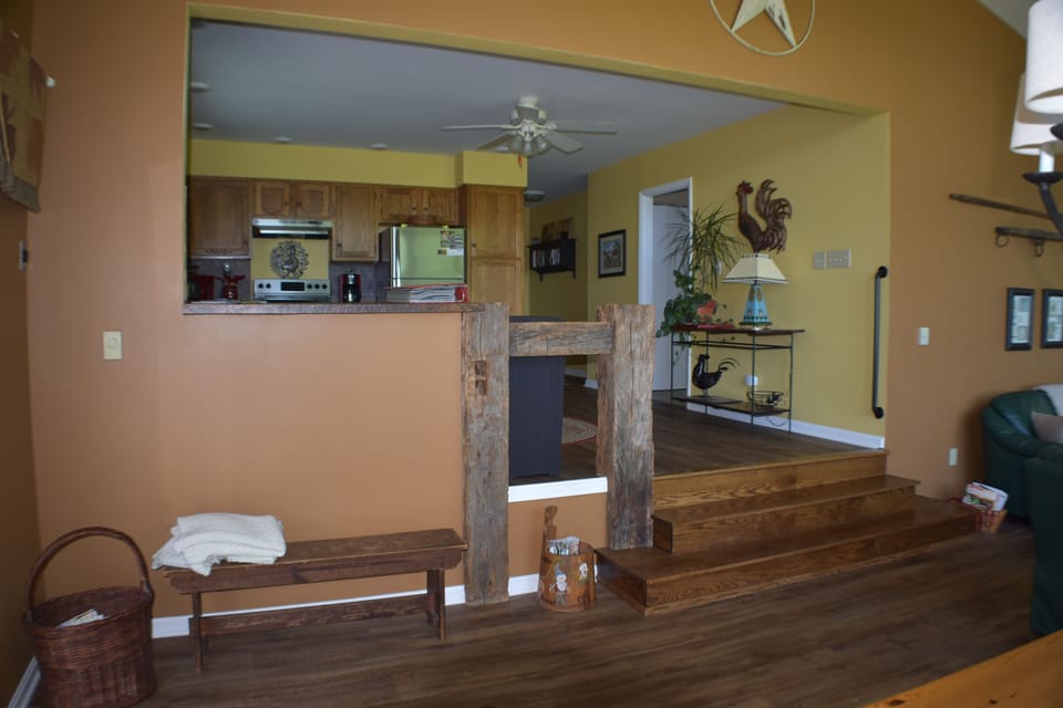 Steps from great room to kitchen. Only two steps inside cottage.