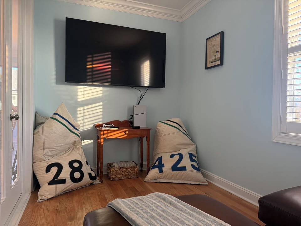 Complete with flat screen/AppleTV/PS5—and 100-year-old antiques for contrast...