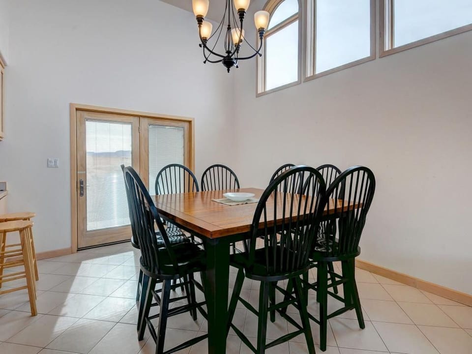 Seating for 20! (8 at the table, 6 bar stools, and 6 at extra folding table) 