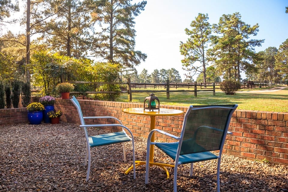 The B&B Patio. Each suite has a little sitting area with umbrella & table 