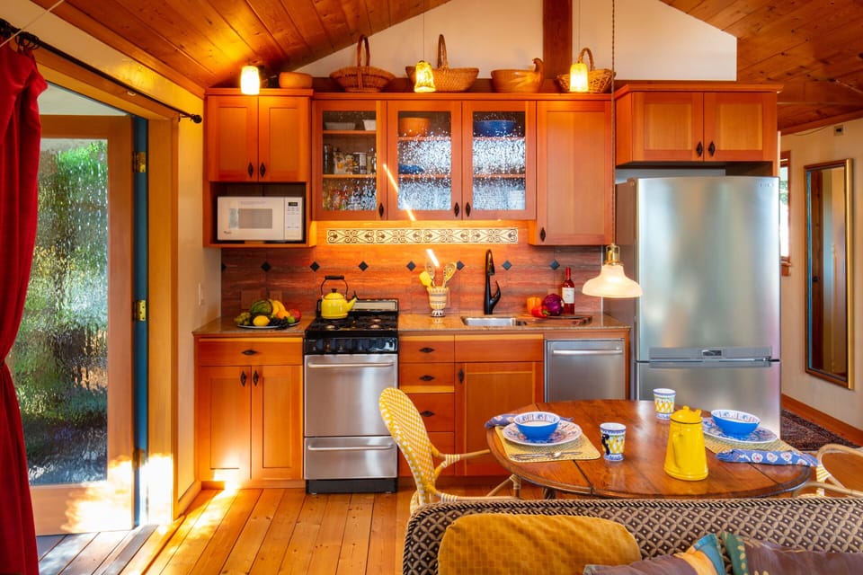 the Pullman type kitchen, pine floors,hand blown glass fixtures