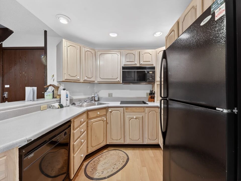 Cook your favorite meals in this fully equipped kitchen with modern appliances and ample counter space for all your culinary adventures.