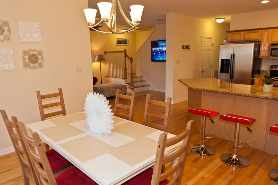 A view of the dining area and the kitchen