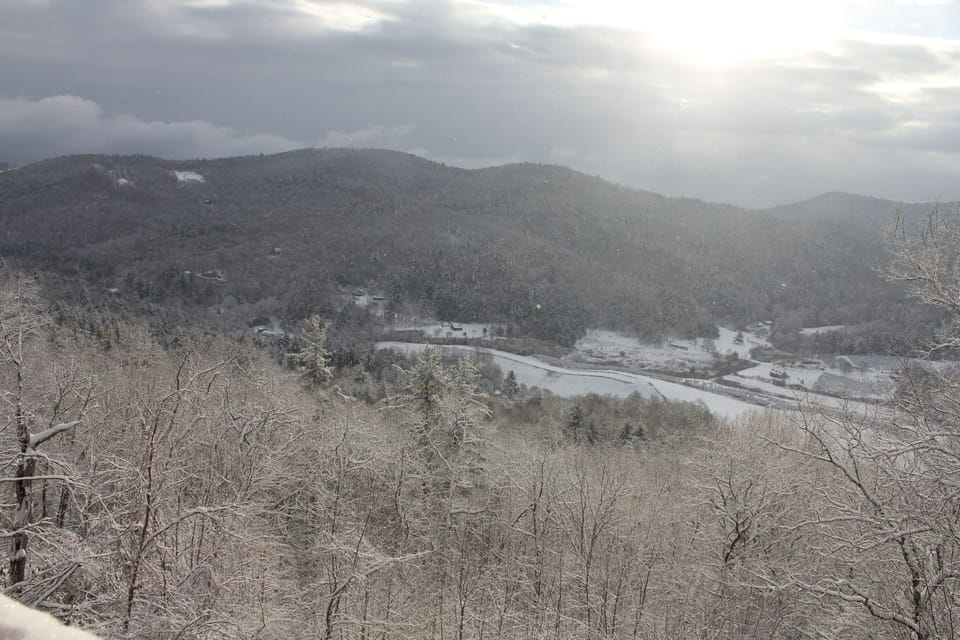 Snow in valley below