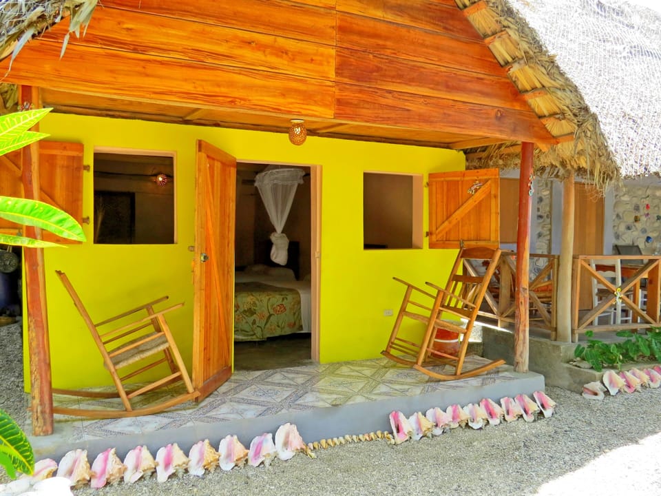 The Garden Cottage; just a few feet from the sea.