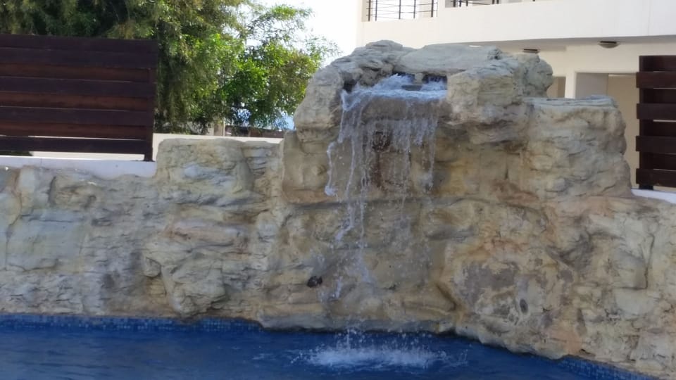 Lovely waterfall feature in the swimming pool