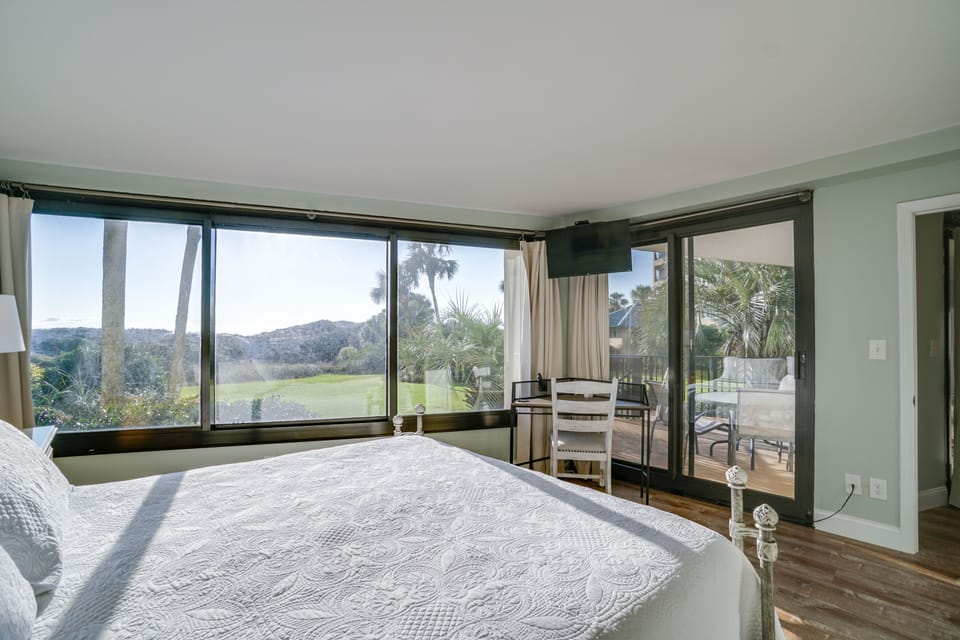 King master with ensuite bathroom and work desk and direct access to large patio