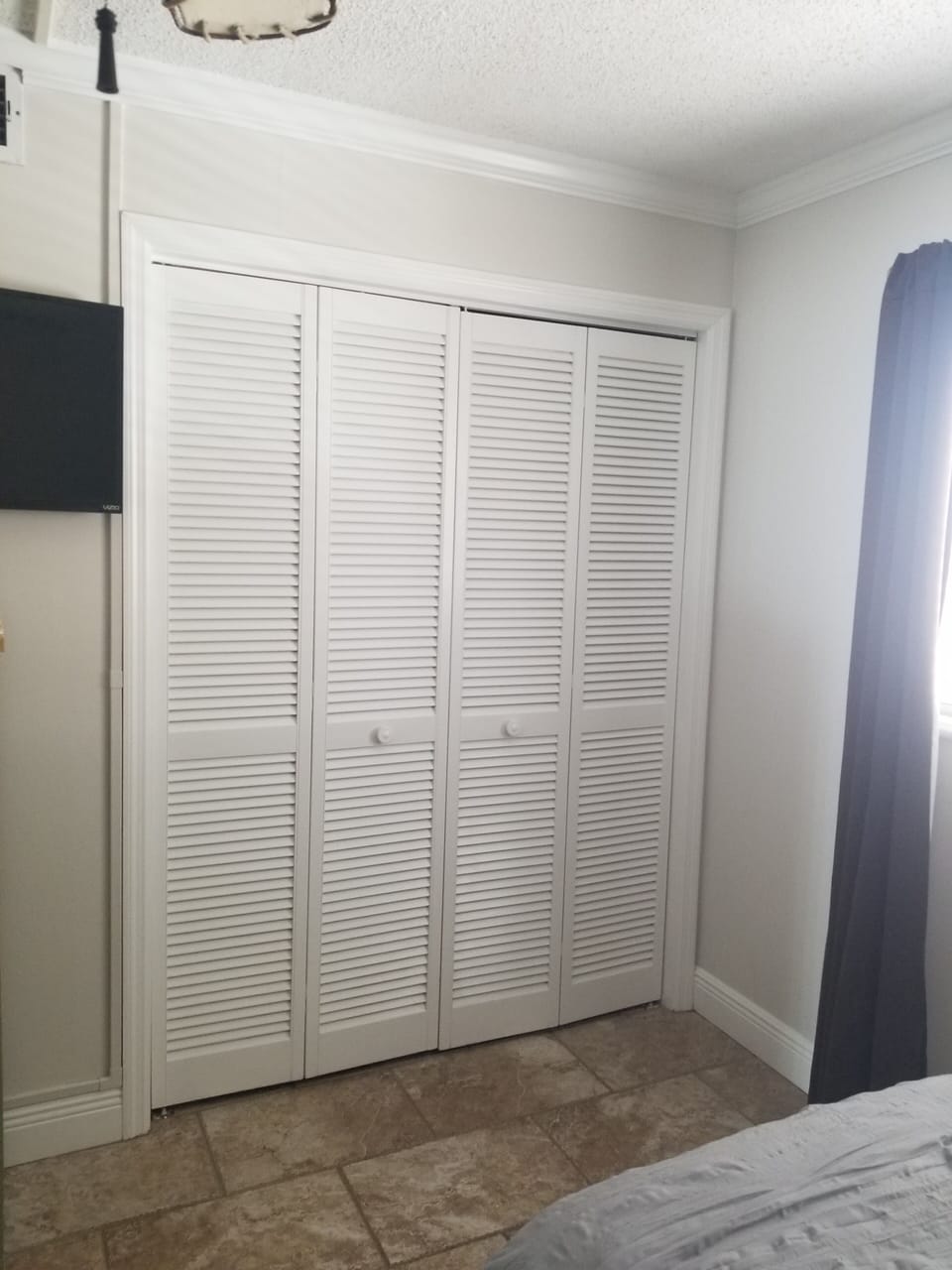 Plenty of storage in the guest bedroom closet.