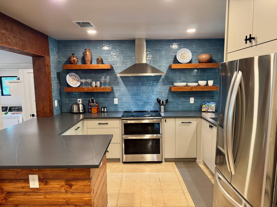 Fully stocked kitchen with double oven