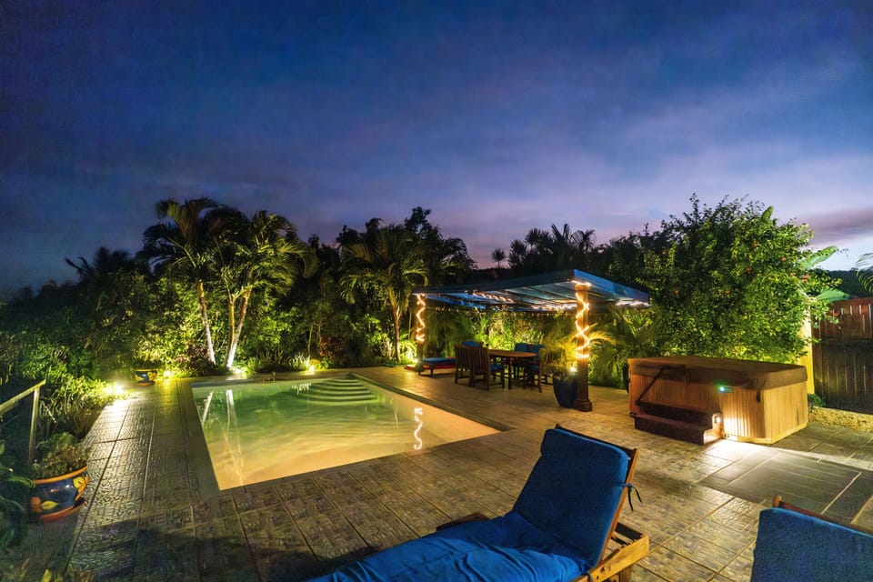 Moonswept Pool deck at dusk