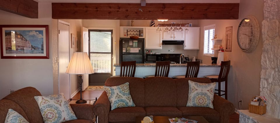 Cozy family room and kitchen with lighthouse theme and new white enamel 2020.