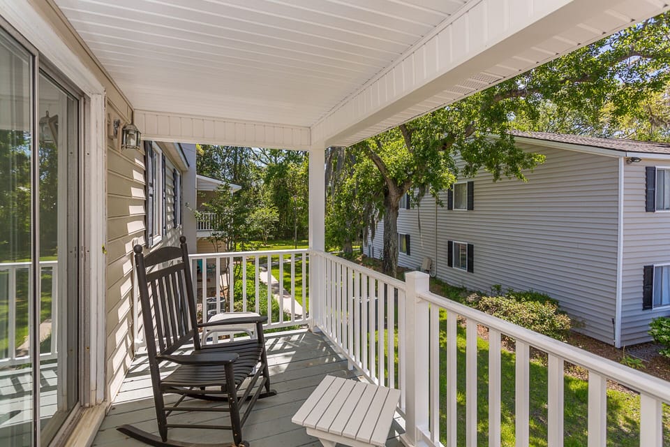 Covered porch - we've added a patio set and installed a ceiling fan too