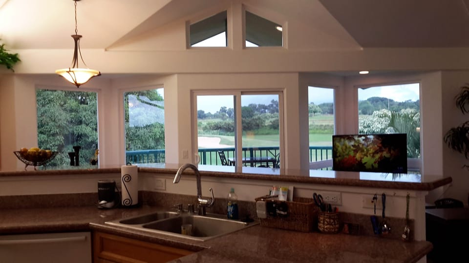 Surrounded in lush landscaping with views, of golf course,  waterfalls & ocean.