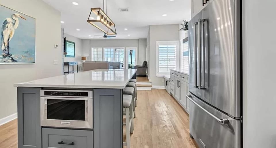 Top of the Line Stainless Steel Appliances, Granite Counter Tops and Elegant Detailed Decor