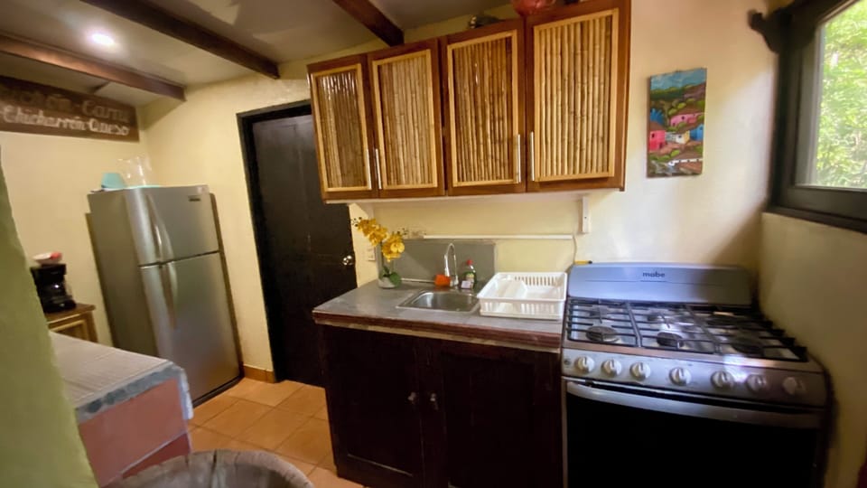 Kitchen with stove, oven, fridge, and everything you need
