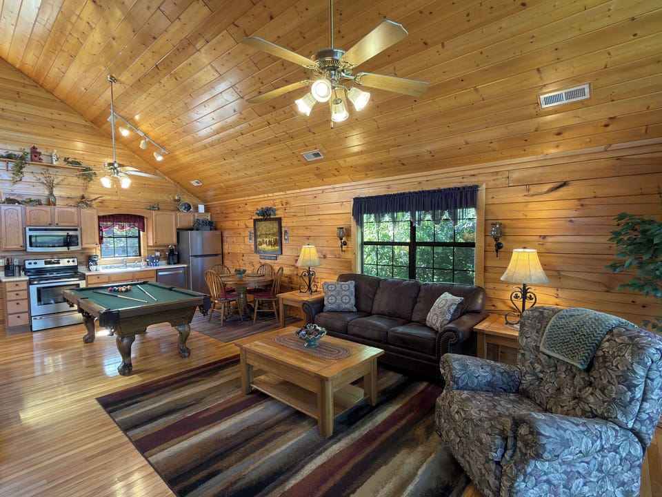 A comfortable living room area and fully equipped kitchen