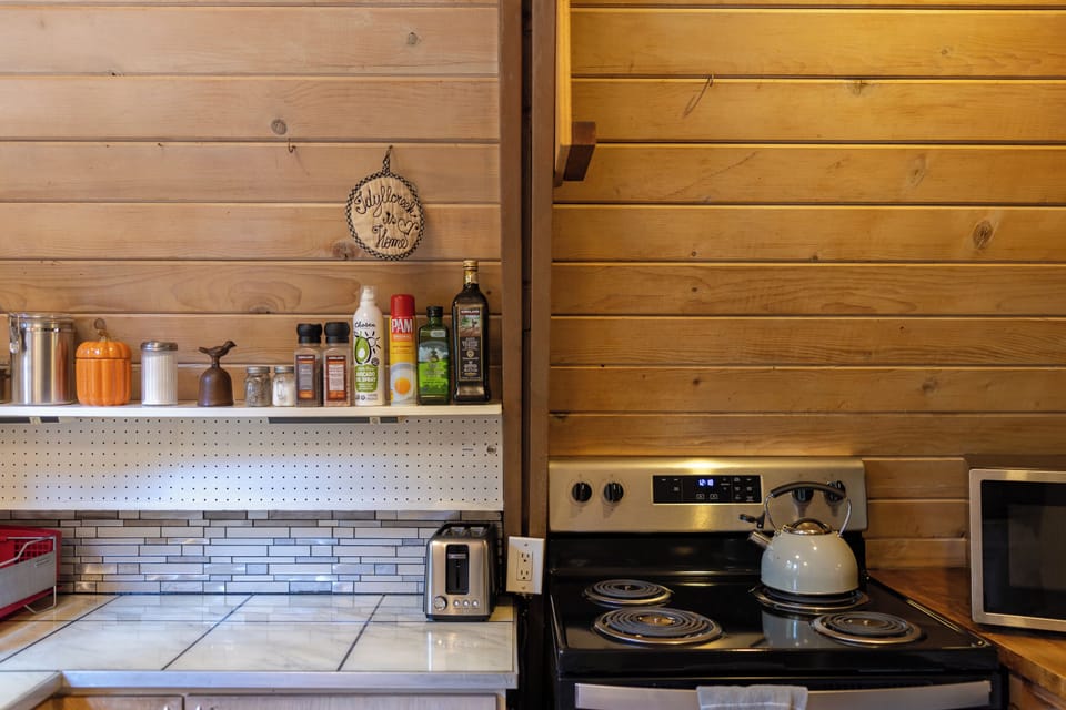 Chef-Ready Kitchen with Provided Spices, Oils, and Cooking Basics.