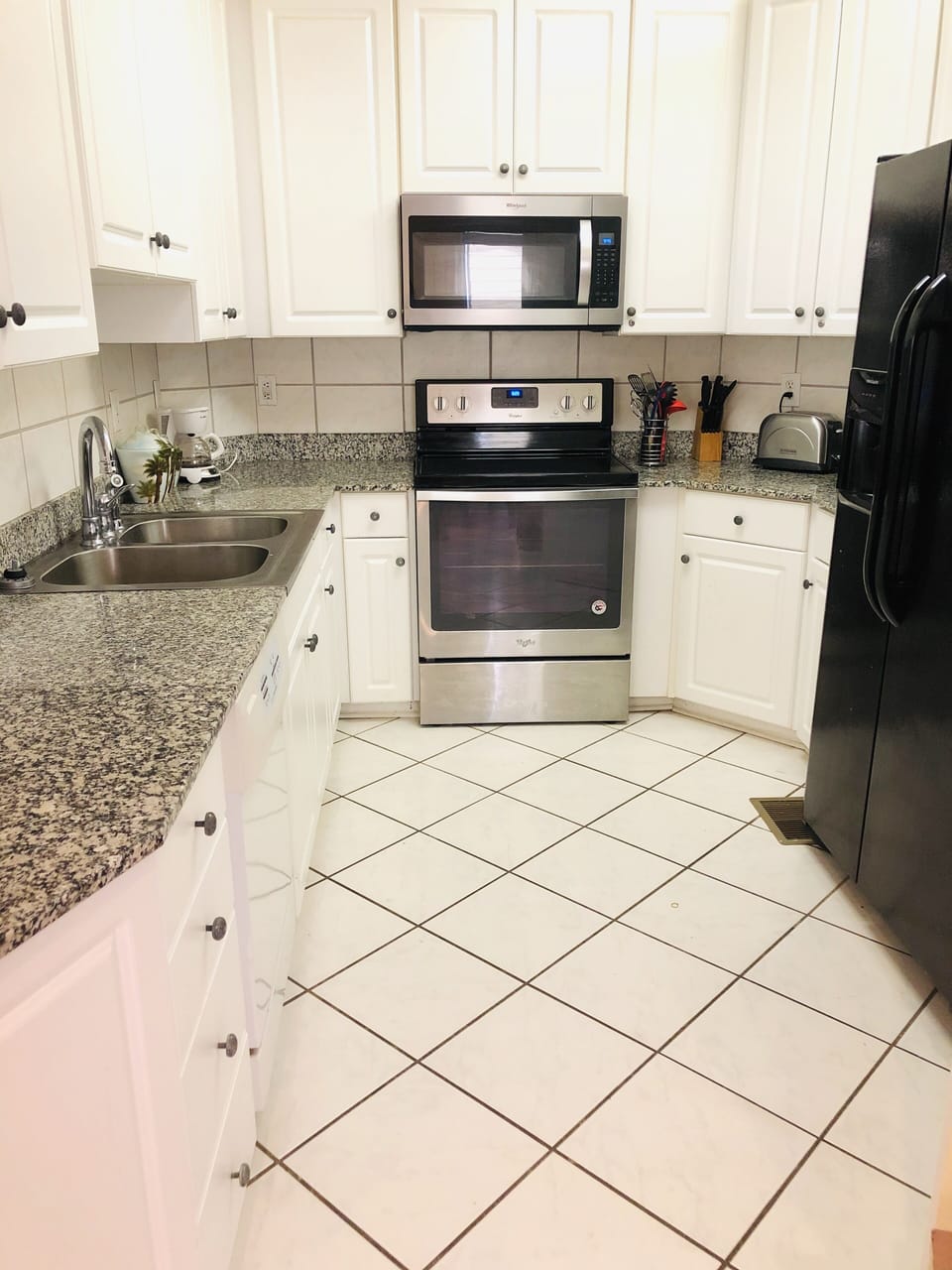 Full kitchen open to the dining area.