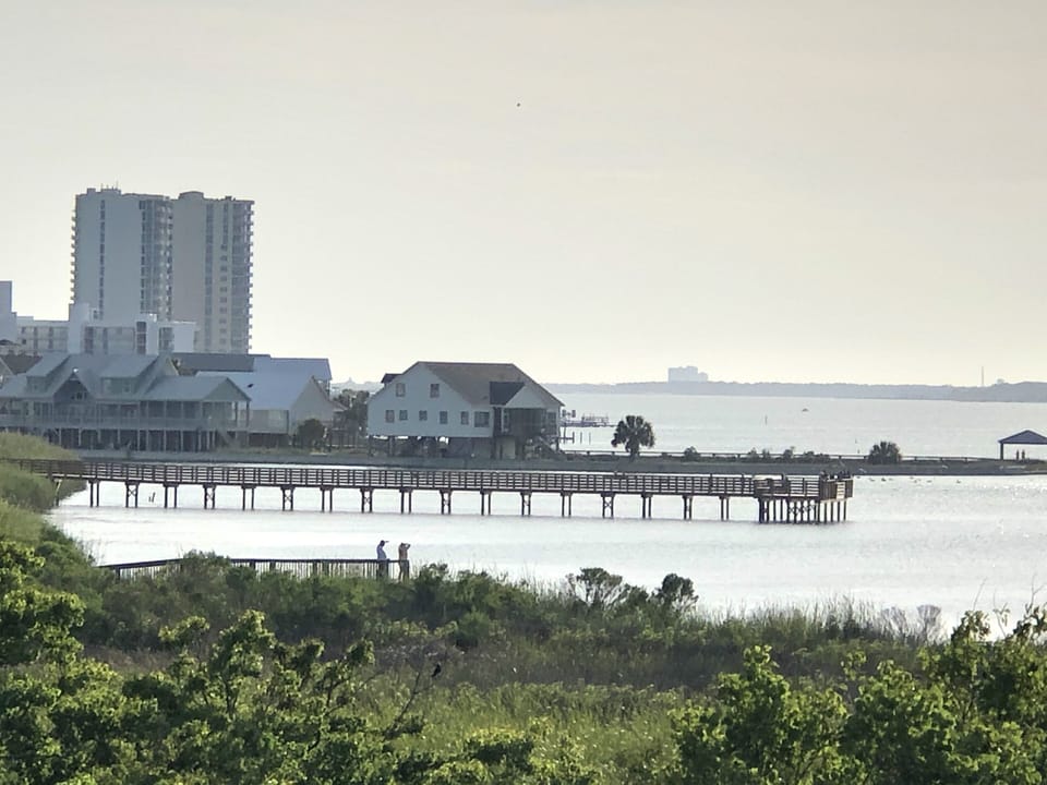 Living room balcony view of new public fishing pier. 