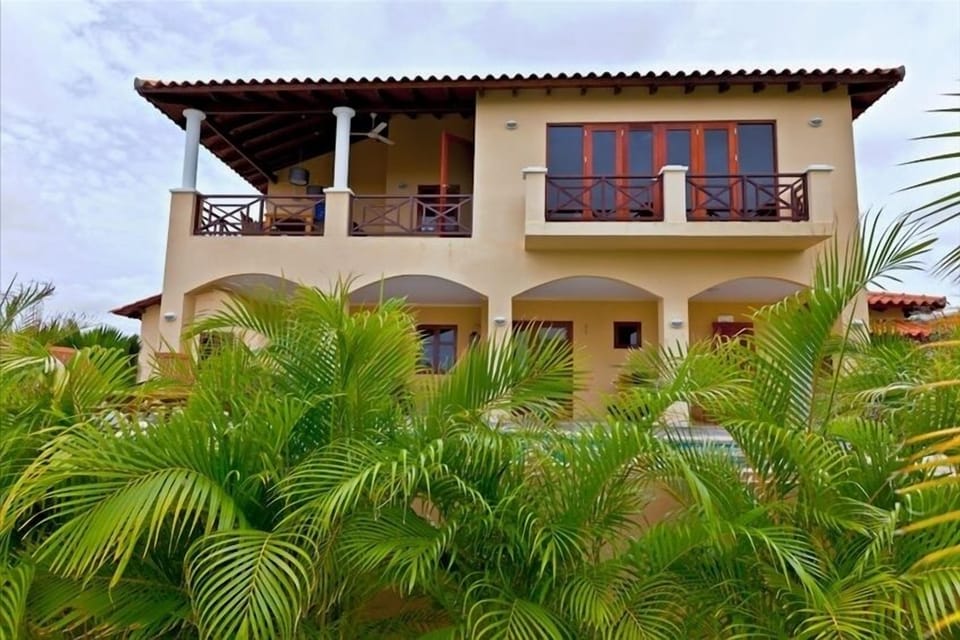 Back of the house, porch, terrace, pool deck and pool