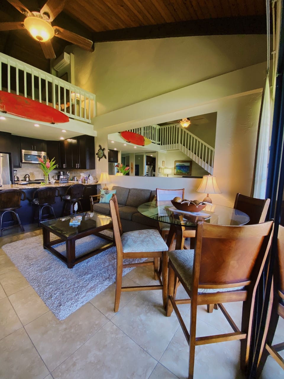 Greatroom with surfboard decor-enjoy the 2 story woodbeam ceilings