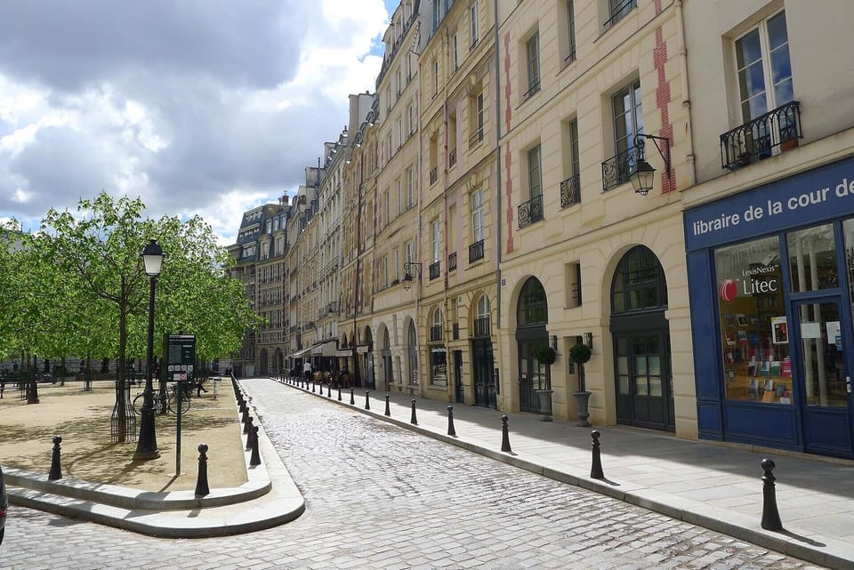 View of the stunning Place Dauphine from the bedroom