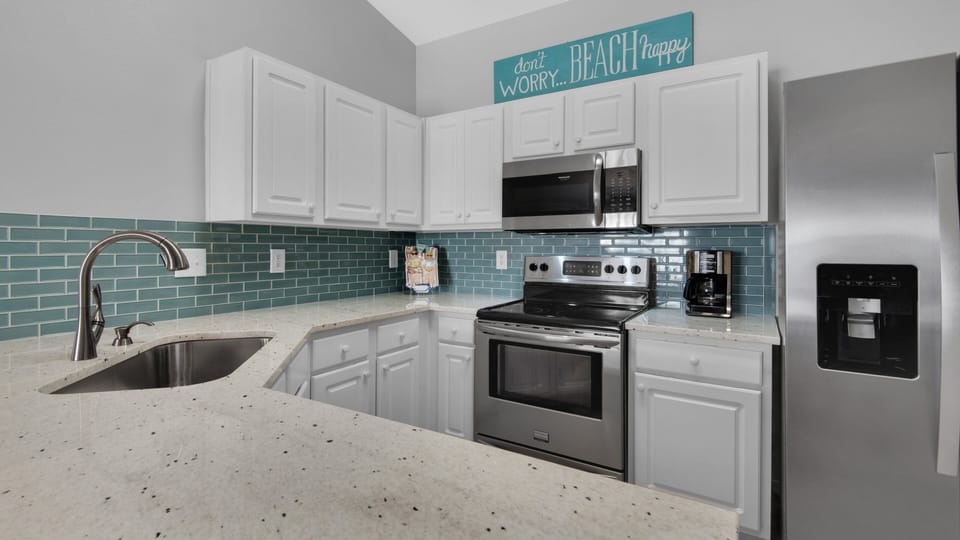 Plenty of beautiful new quartz counters for easy prep.