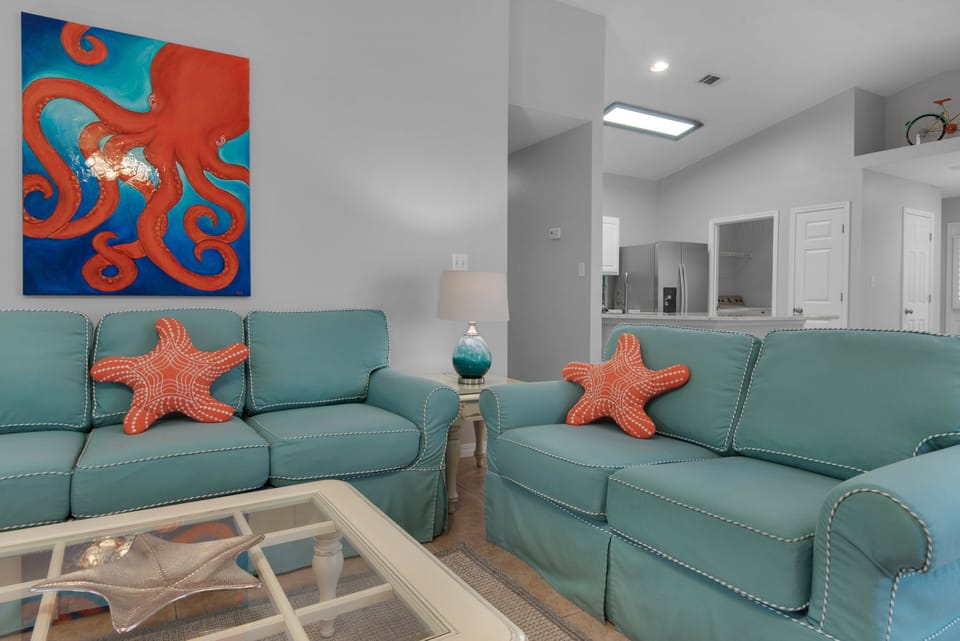 Fresh and light living area with queen sleeper sofa