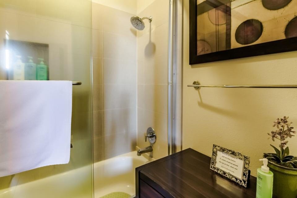 tub/shower room. Luxury brand shampoo, conditioner, body wash, & lotion provided