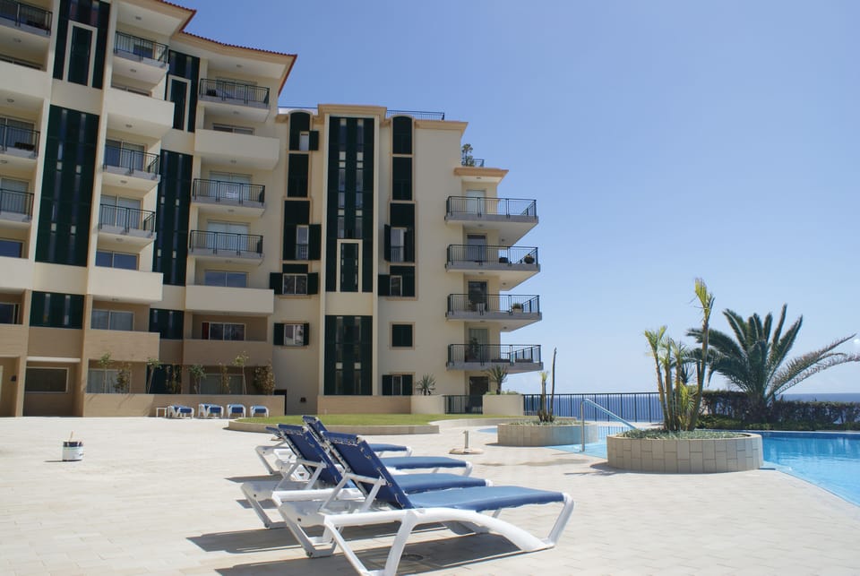 The pool area at Vila Formosa, sunbeds included