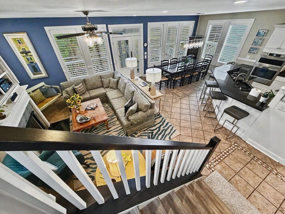 Spacious open-concept living. Enjoy marshfront Lowcountry living with a gourmet kitchen, an oversized sectional, and lots of seating.