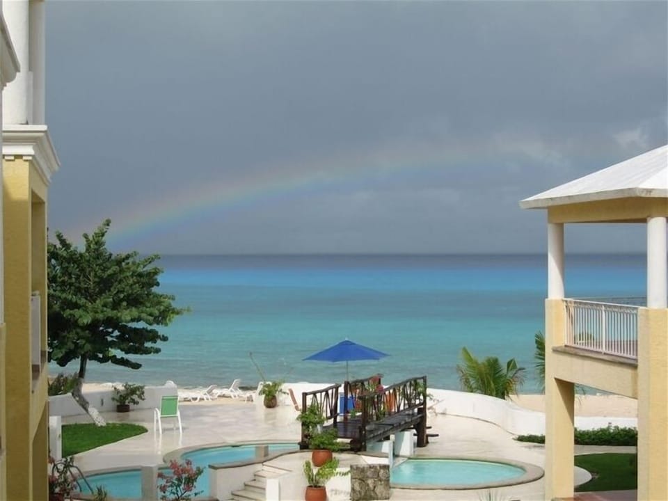 Breathtaking Views of Rainbows & Sunsets from Your Private Veranda