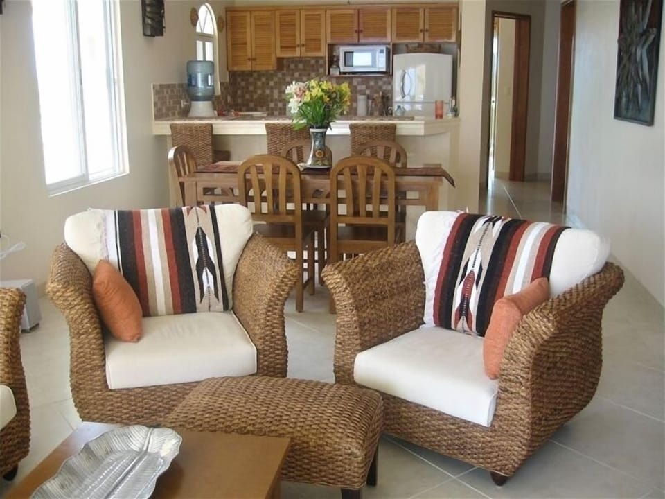 Sit, Relax and Enjoy Your Vacation in this Tropically Furnished Family Room