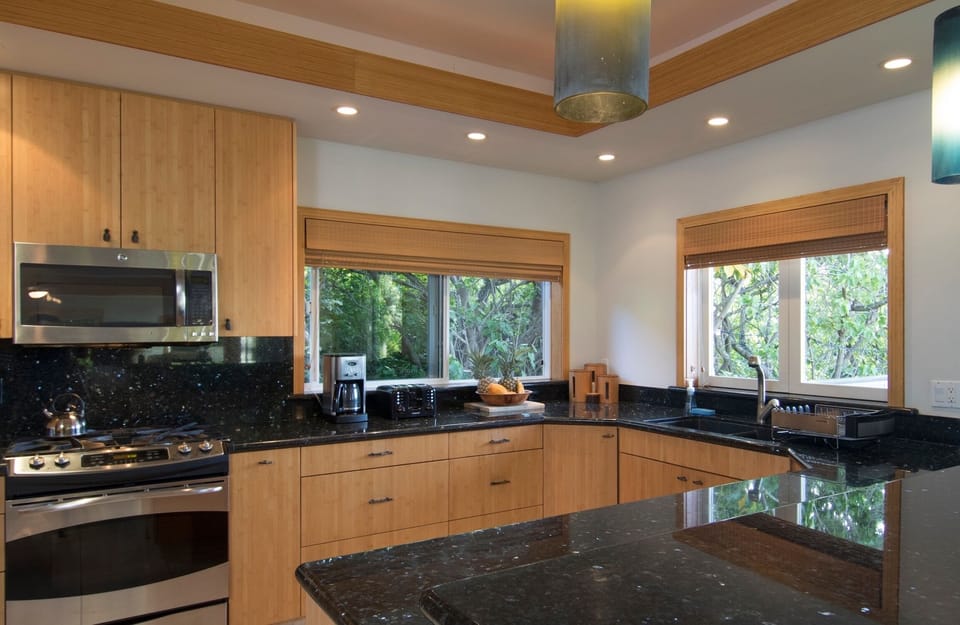 State of the art kitchen with all modern appliances and granite countertops