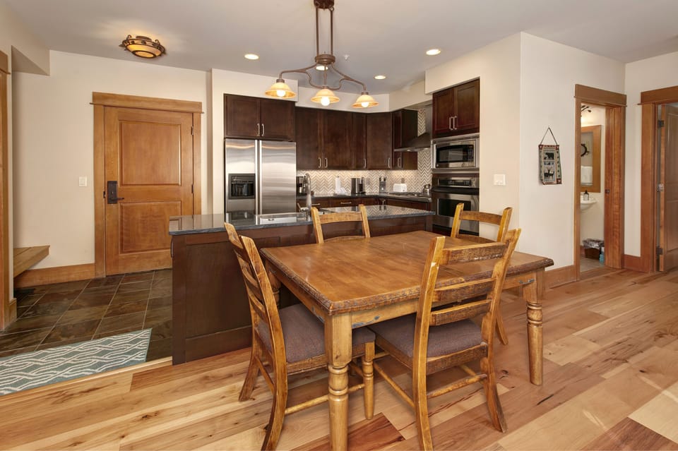 Dining table that expands to seat six.