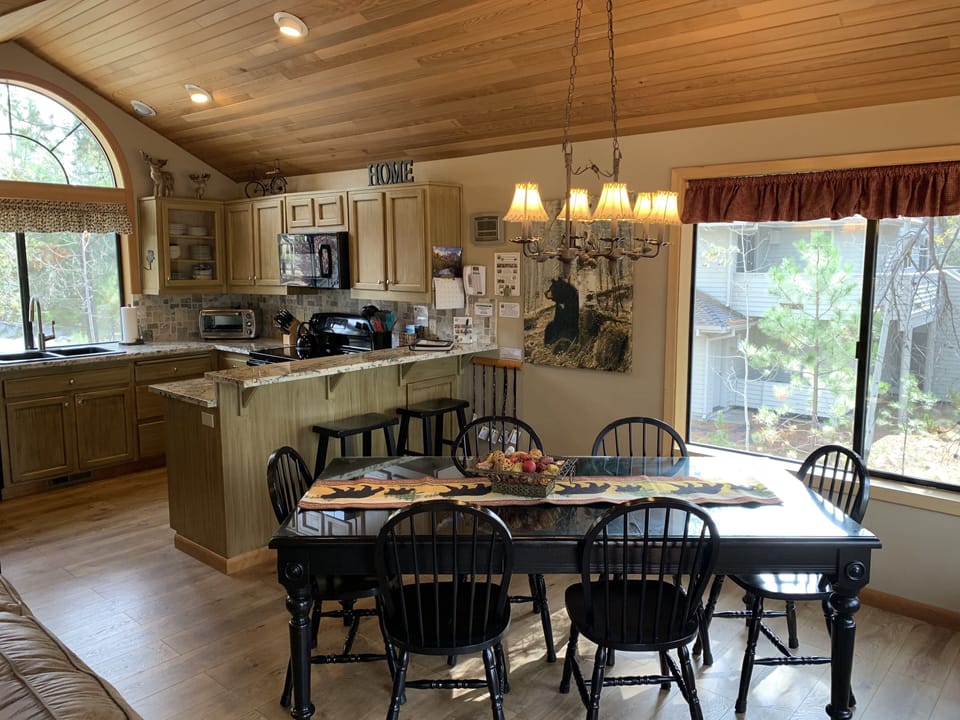 There is seating for 8 at the table, and two more at the bar

