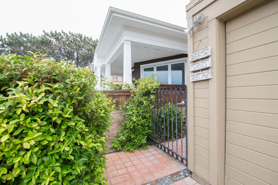 the side entrance from the main house leads back to the unit 