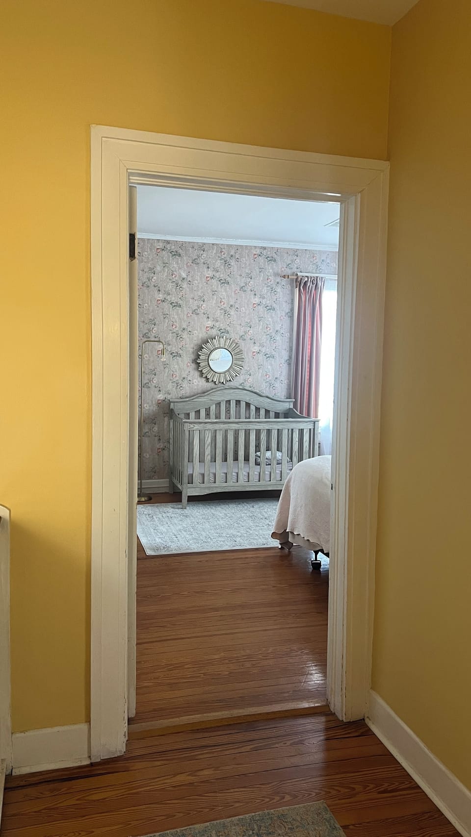 Crib in 2nd bedroom with king bed