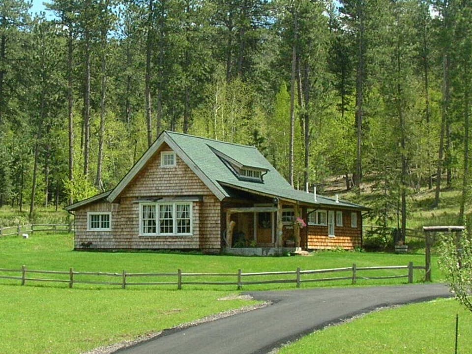 Beautiful, private cottage on 5 acres bordering Forest Service land.