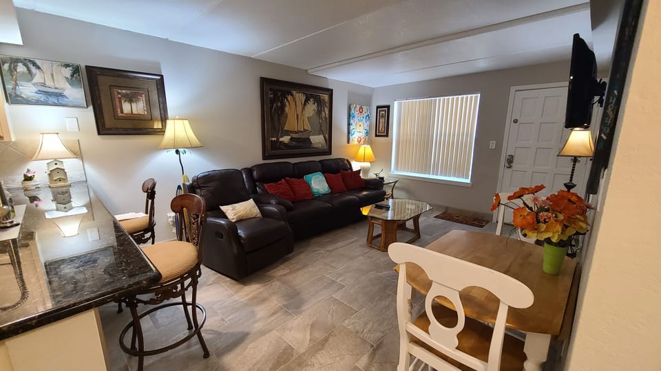 Enjoy REMODELED BEACH CONDO new bath, air conditioning heated pool washer dryer 