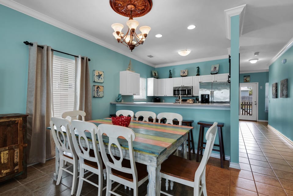 Large dining room table that seats up to 8 plus more at the counter.