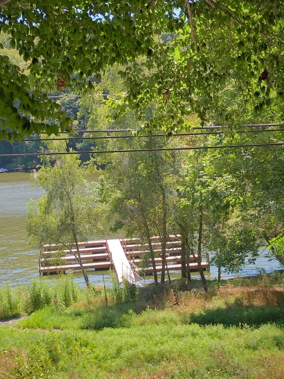 Slip available for rent, on left, closest to shore . View of slip from porch. 
